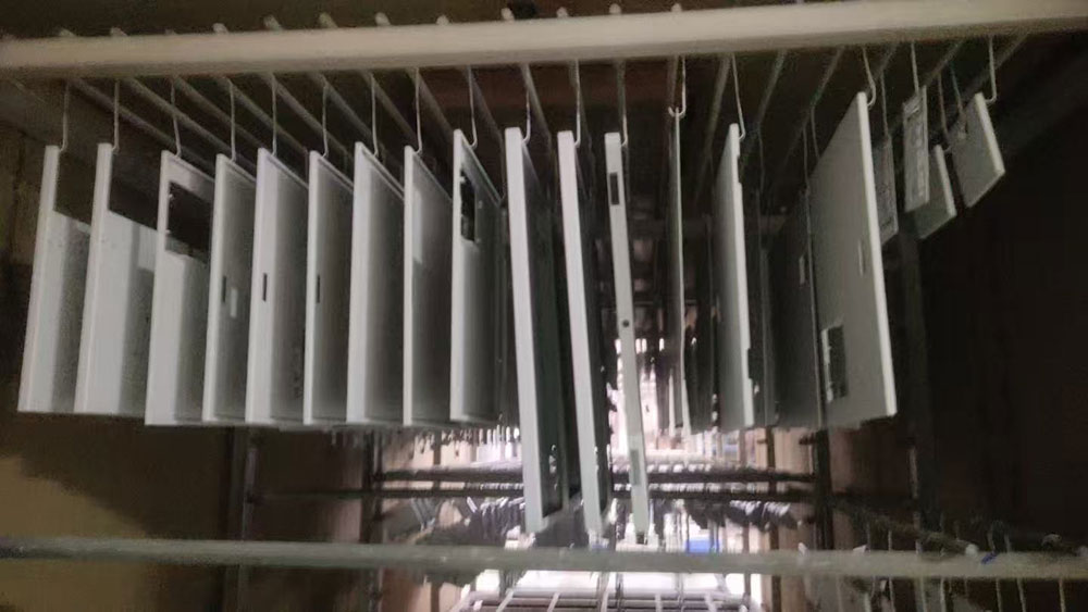 Powder coating of equipment housing